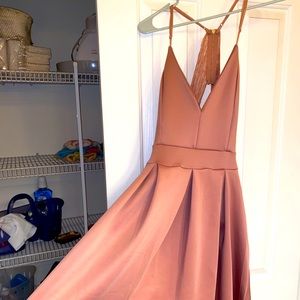 Formal flowing pink dress with lace backing